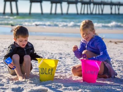 sandbuckets on white powder sand